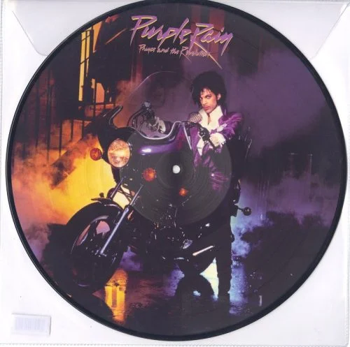Limited vinyl picture disc LP pressing. Purple Rain is the sixth studio album by Prince, the first to feature his backing band The Revolution